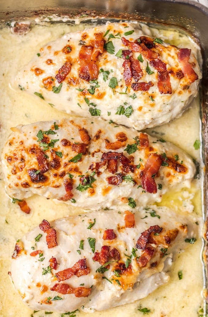 close up on baked ranch chicken topped with bacon