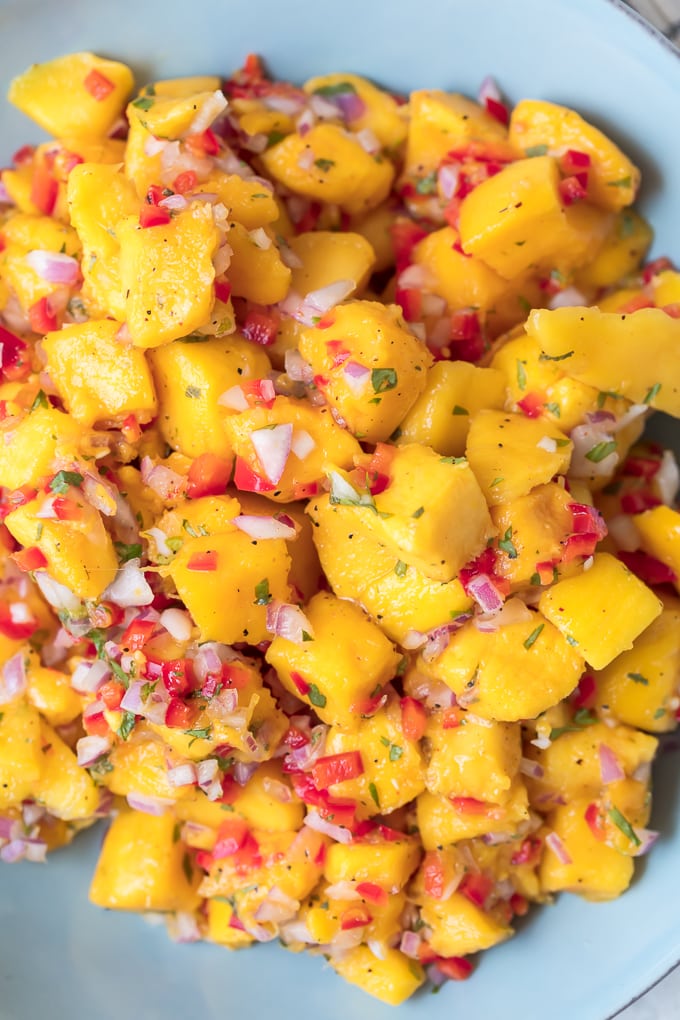 How to make mango salsa: mango, peppers, onions, and more