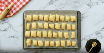 salted pretzel bites on a baking sheet.