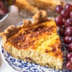 This Quiche Lorraine recipe is perfect for breakfast, brunch, or lunch. The pastry crust is filled with an egg & cream mixture full of bacon and cheese!