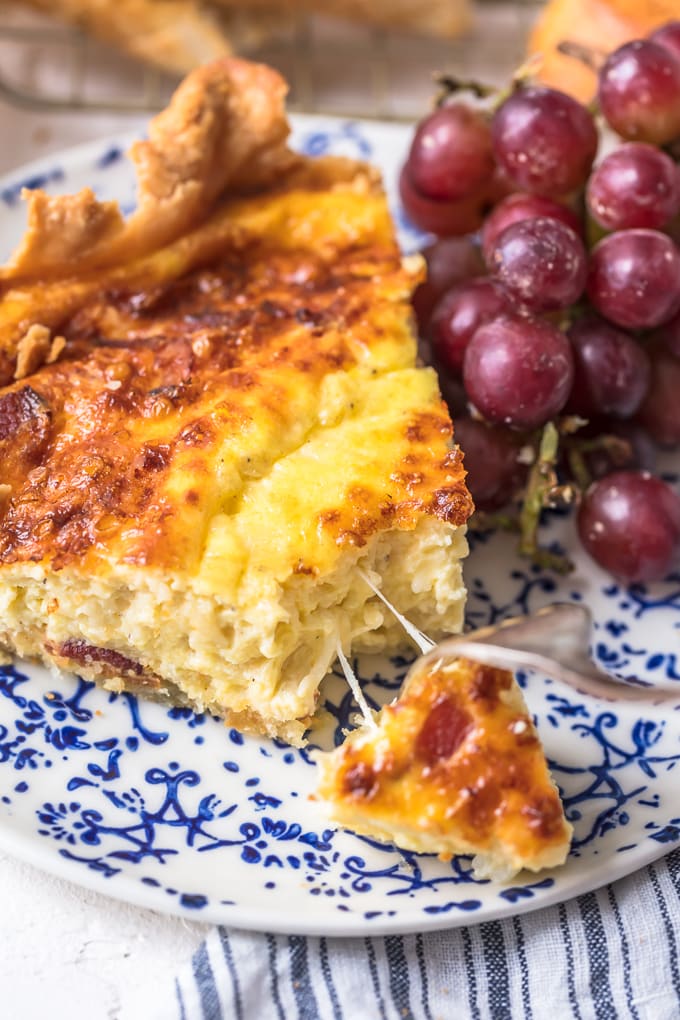 Cheesy quiche on a blue and white plate