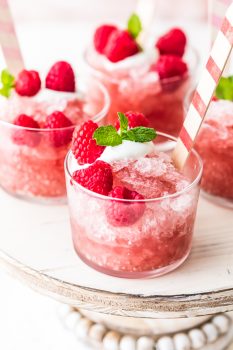 Raspberry Rose Granita is the perfect treat for hot summer days. This fresh, fruity, icy dessert can be made in so many flavors, and this raspberry rose flavor is sweet and juicy.