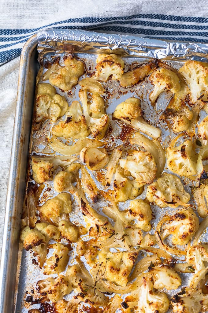 crispy cauliflower side dish on a silver baking tray