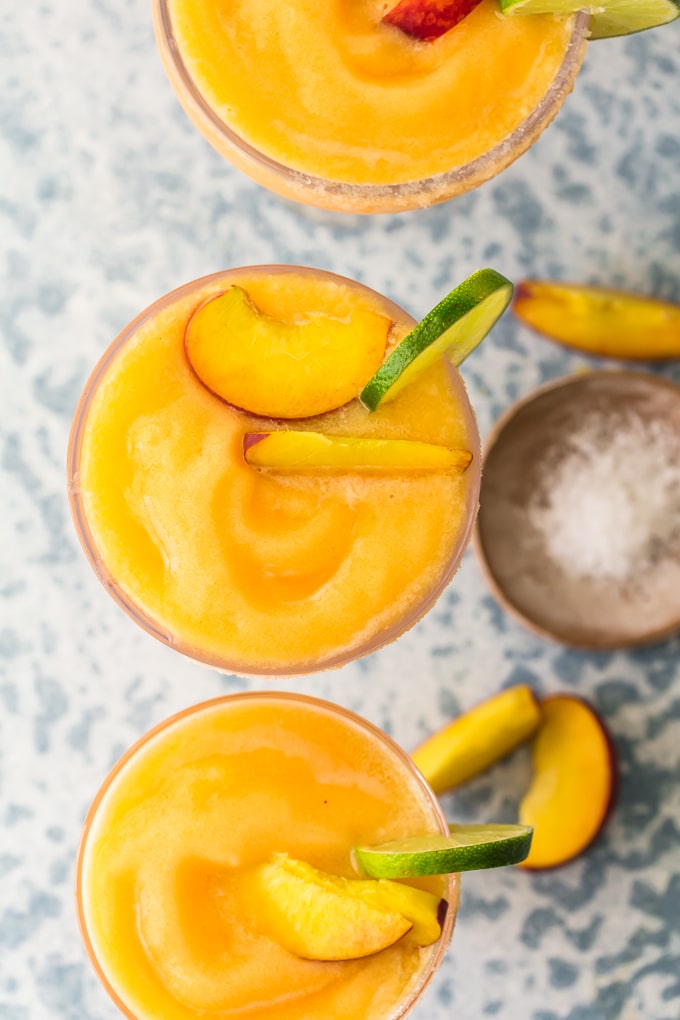 top view of peach margaritas in a glass