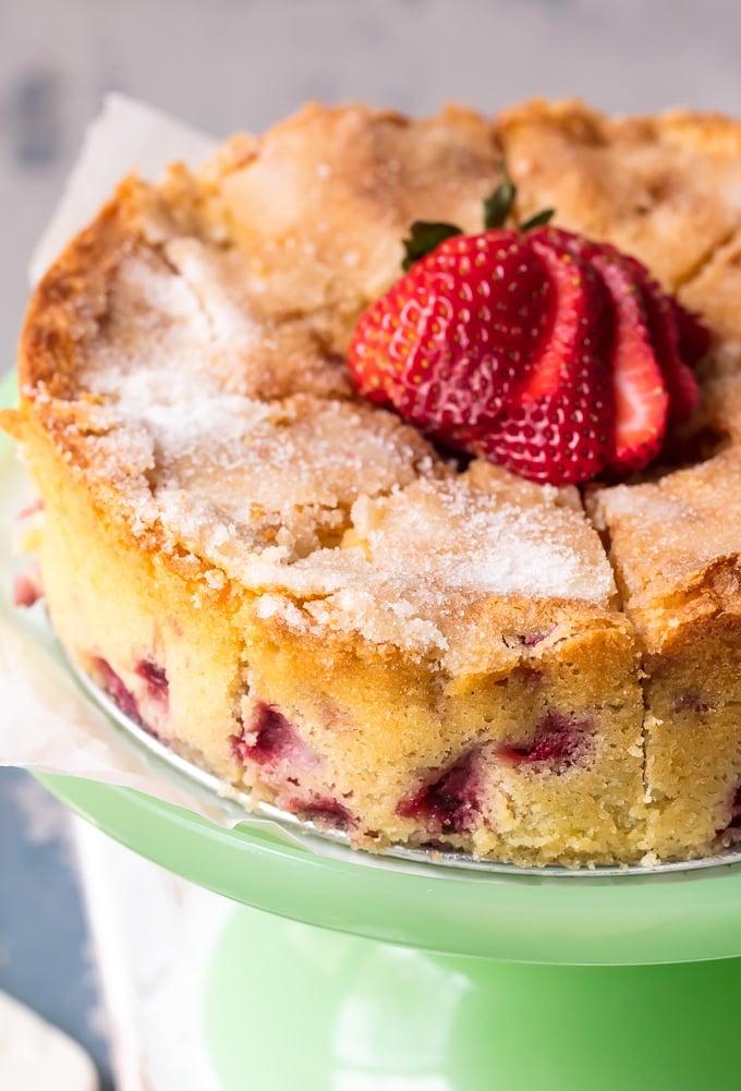 Strawberry Buttermilk Cake recipe topped with sugar and strawberries