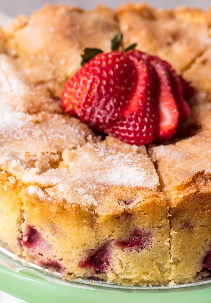 Fresh strawberries on top of a buttermilk cake