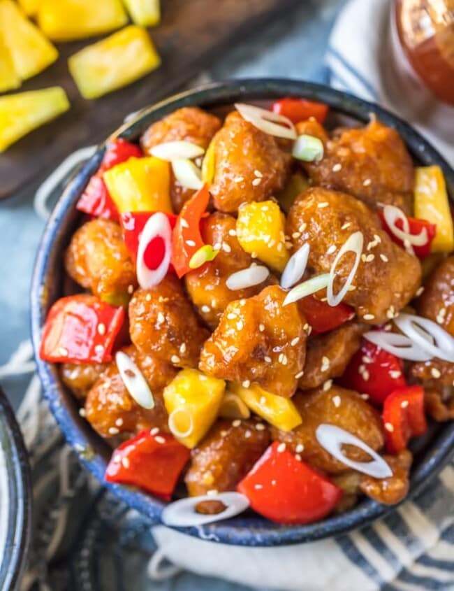 Sweet and Sour Chicken is a typical dish you'll find at Chinese-American restaurants. I love the crispy, tangy flavor of this sweet and sour chicken recipe! It's best served with white rice, vegetables, and my homemade sweet and sour chicken sauce.