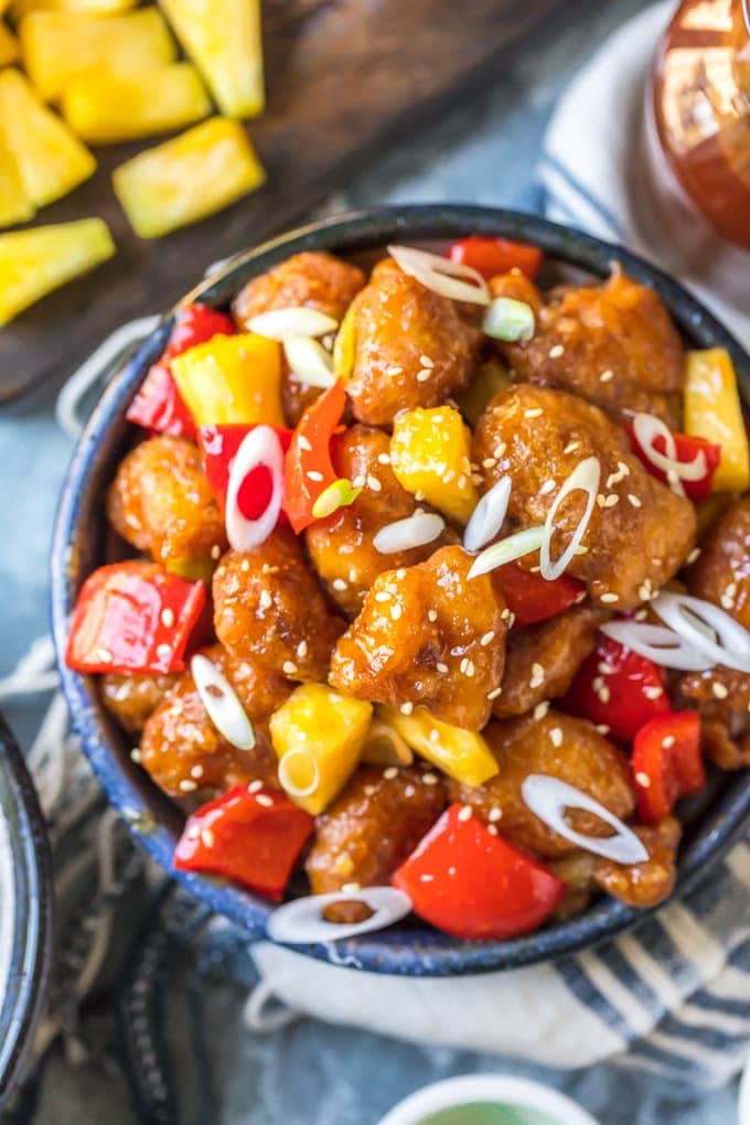 Sweet and sour chicken mixed with pineapple and red peppers