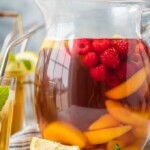 pticher of sweet tea sangria with sliced fruit