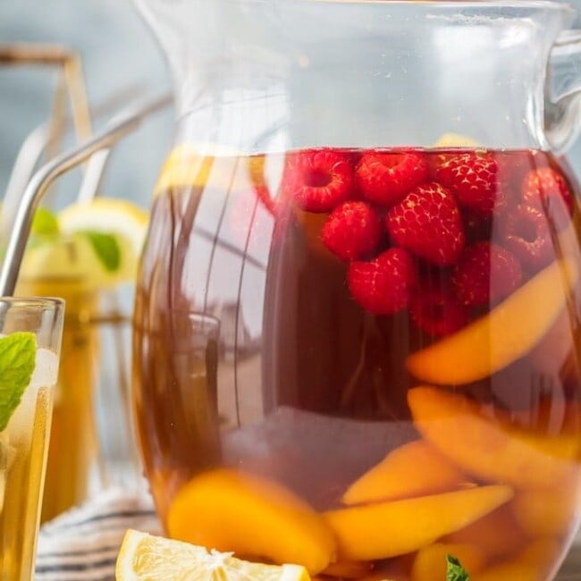 pticher of sweet tea sangria with sliced fruit