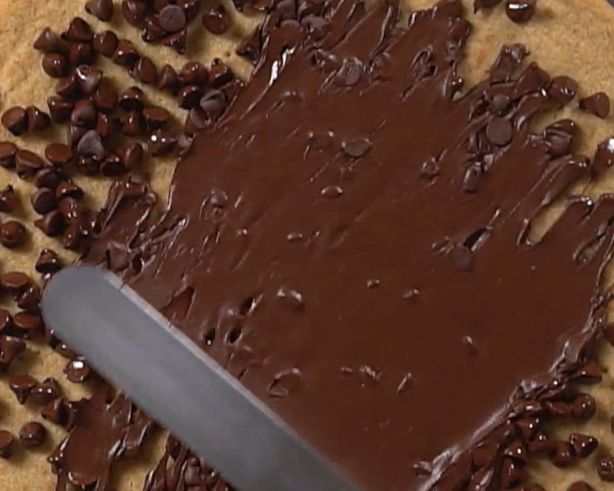 Spreading the melted chocolate chips.