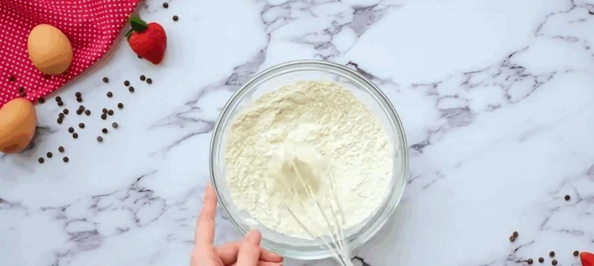 Combining flour and salt.