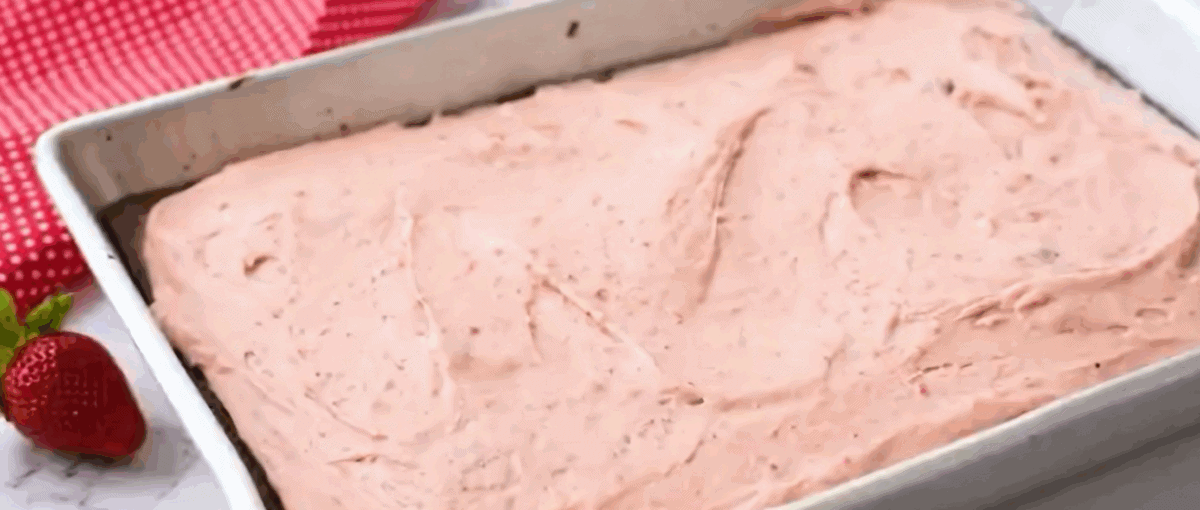 Strawberry layer poured on top of brownies.