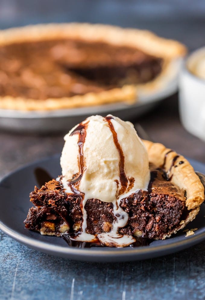 Brownie Pie is a rich, chocolaty dessert that's almost too good to be true! A homemade fudge brownie recipe baked straight into a pie crust gives you two desserts in one. Brownie Pie topped with ice cream
