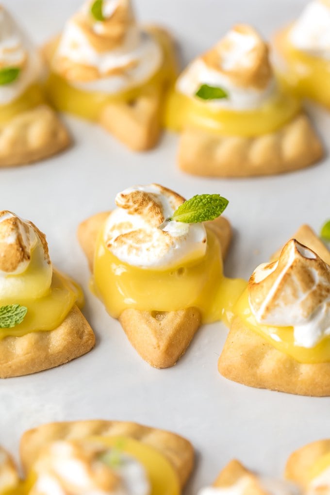 Shortbread triangle cookies with lemon curd and fresh meringue