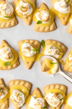 These lemon meringue cookies are a fun, bite-sized version of lemon meringue pie! These easy lemon meringue pie tarts are the perfect dessert to serve at parties!