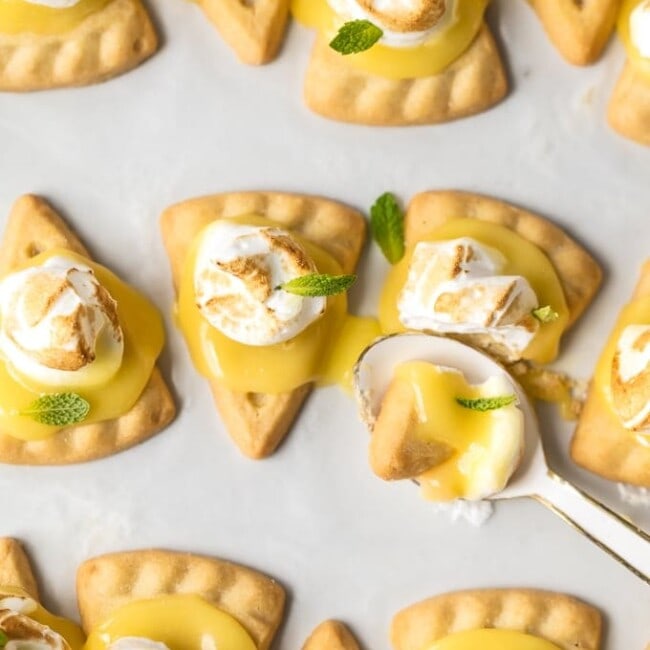 These lemon meringue cookies are a fun, bite-sized version of lemon meringue pie! These easy lemon meringue pie tarts are the perfect dessert to serve at parties!