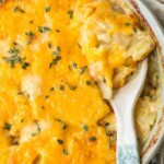 Cheesy Scalloped Potatoes are the perfect side dish for holidays. This easy cheesy scalloped potatoes recipe is creamy, delicious, and easy to make ahead of time!