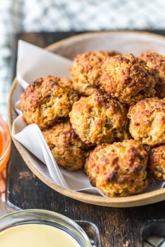 This classic Sausage Balls recipe is savory, cheesy, and tasty! These Bisquick sausage balls are the perfect appetizer for holidays or game day. Serve them with apricot sweet chili dipping sauce!
