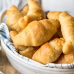 Homemade Crescent Rolls are soft, flaky, buttery & oh so delicious! Make this crescent roll recipe for every holiday meal, or for any dinner that needs something extra.