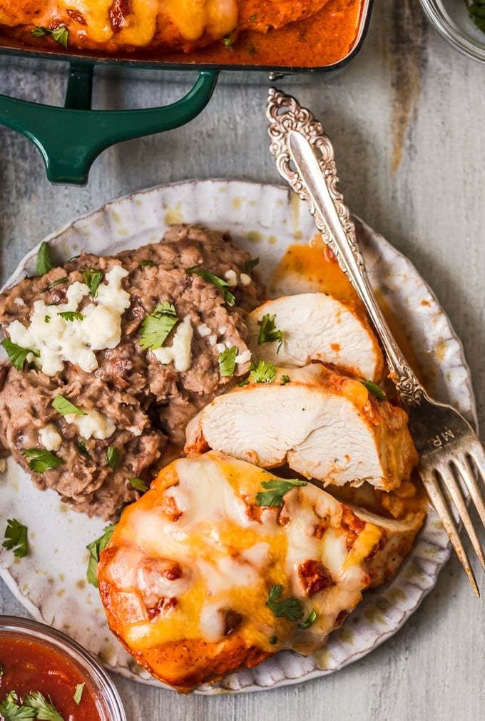 A plate of chicken breast and refried beans