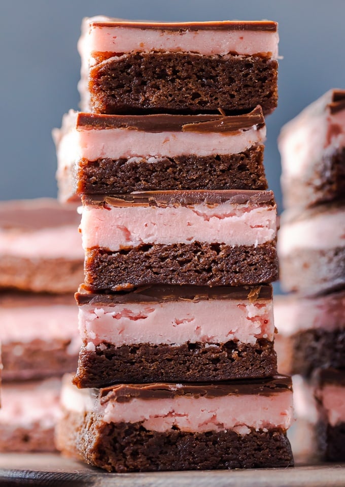 A stack of chocolate covered strawberry brownies