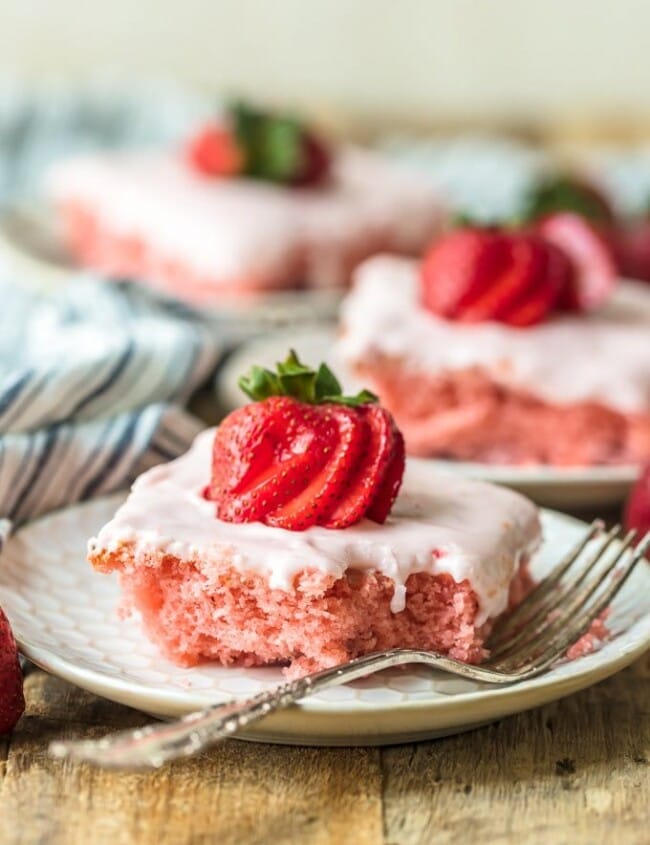 This FRESH STRAWBERRY CAKE recipe is so light, sweet, and easy to make. And with the Strawberry Cream Cheese Icing, this easy cake recipe is just too delicious to resist!
