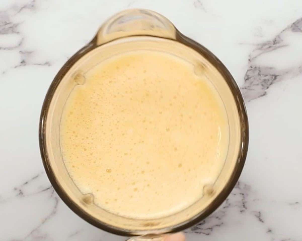 Blended frose ingredients in a blender.