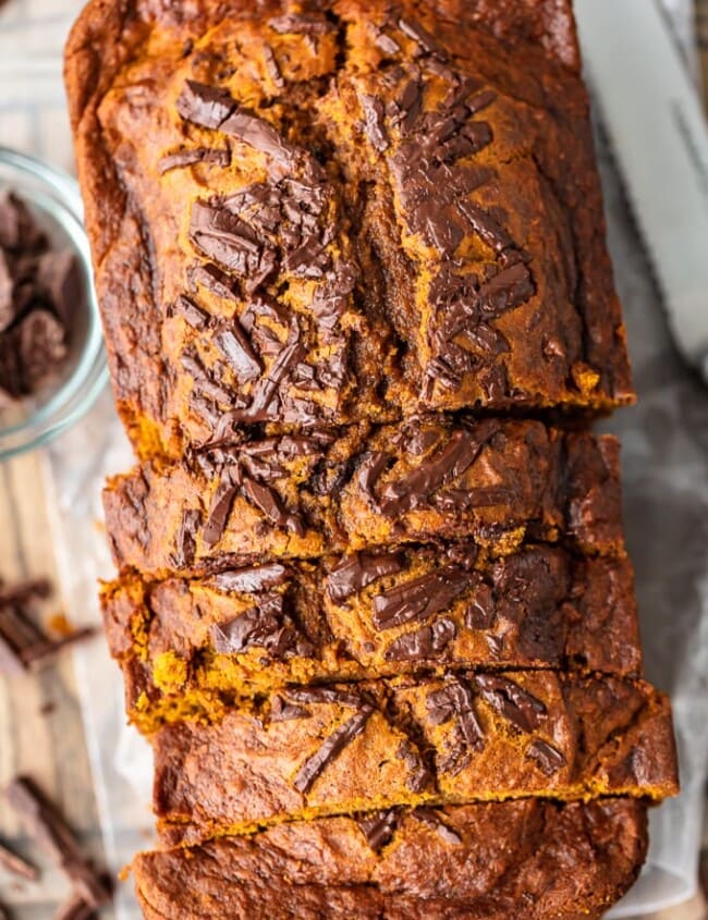 Pumpkin Chocolate Chip Bread is the perfect fall recipe. It's chocolatey, it's pumpkiny, and it's super delicious! This easy pumpkin bread recipe is simple enough to make any time you need a treat throughout the season, and it makes a fun holiday recipe too. This recipe for pumpkin bread with chocolate chips mixes everything I love about autumn!