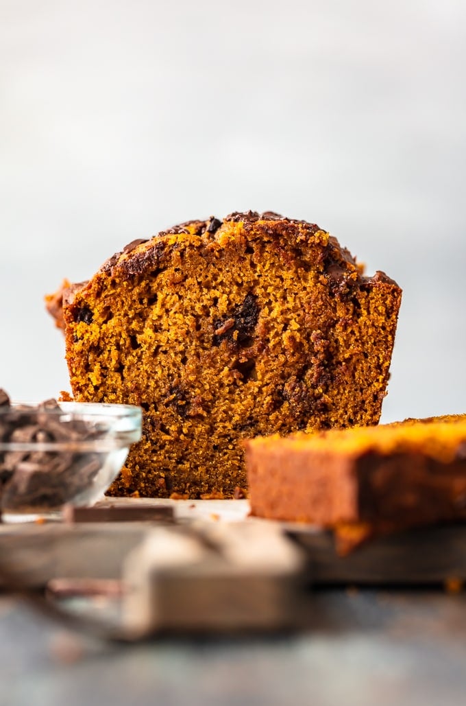 A loaf of pumpkin chocolate chip bread, viewed from the front