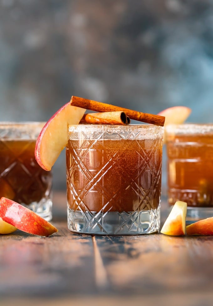 apple butter old fashioned in glass garnished with apple and cinnamon
