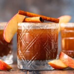 apple butter old fashioned in glass garnished with apple and cinnamon