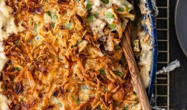 Classic Green Bean Casserole is one of those Thanksgiving recipes that you don't need to reinvent. It's absolutely perfect just the way it is, with green beans, cream of mushroom, crunchy fried onions, and some other awesome ingredients. This green bean casserole recipe is exactly what you need for you next holiday meal!