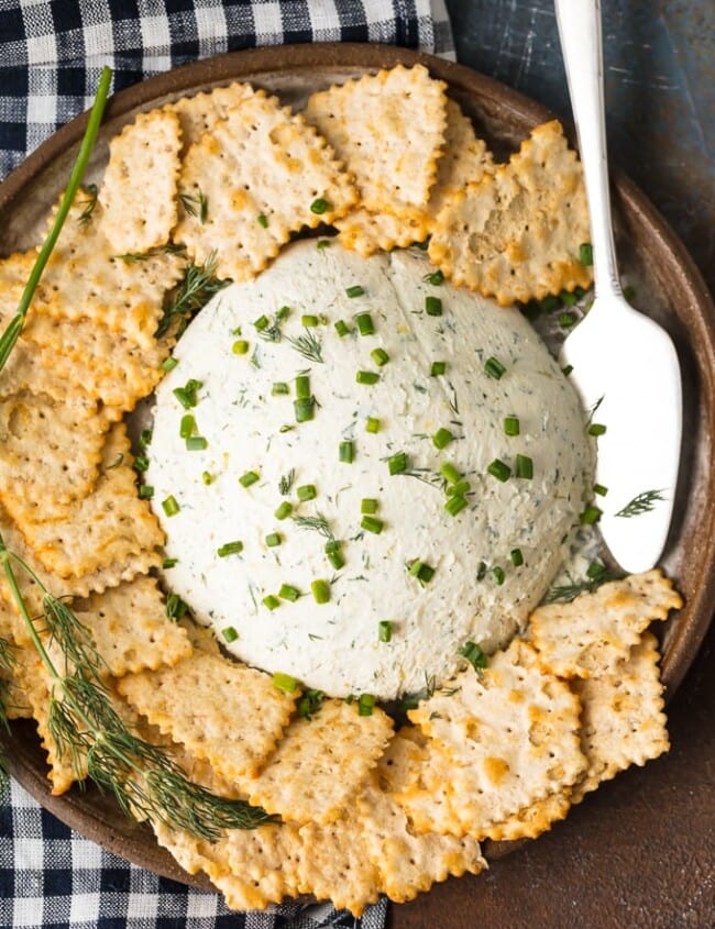 Herb Cream Cheese Dip is a simple yet delicious dip that's perfect for any party or any occasion. Serve it with crackers and guests will devour it! This Herb Coeur a la Creme recipe is savory, tasty, and super easy. There are so many uses for outside of dipping, you will be amazed!