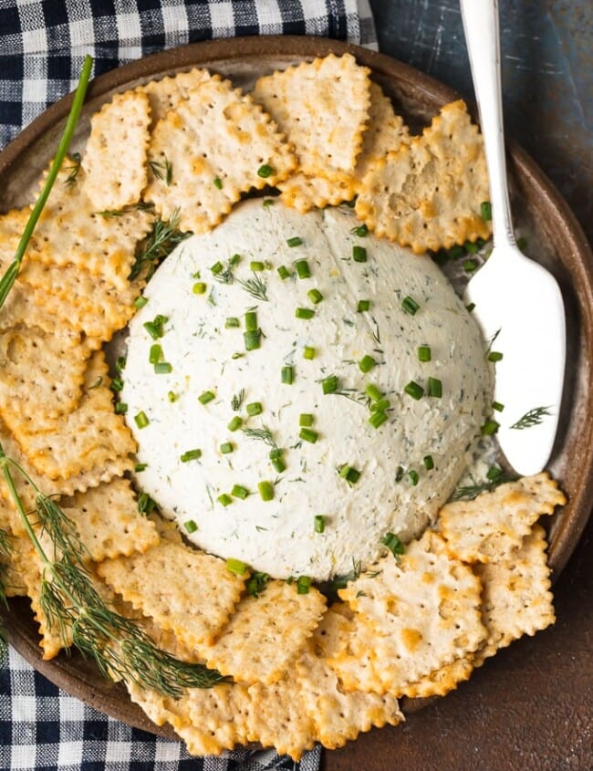 Herb Cream Cheese Dip is a simple yet delicious dip that's perfect for any party or any occasion. Serve it with crackers and guests will devour it! This Herb Coeur a la Creme recipe is savory, tasty, and super easy. There are so many uses for outside of dipping, you will be amazed!