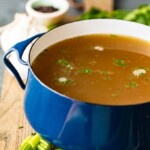 Homemade Chicken Broth is so easy to make, you won't need to buy it from the store anymore. This delicious chicken broth recipe is made with lots of vegetables, spices, and chicken to create the perfect flavor. Learn how to make chicken broth and use it in all of your soups this winter season!