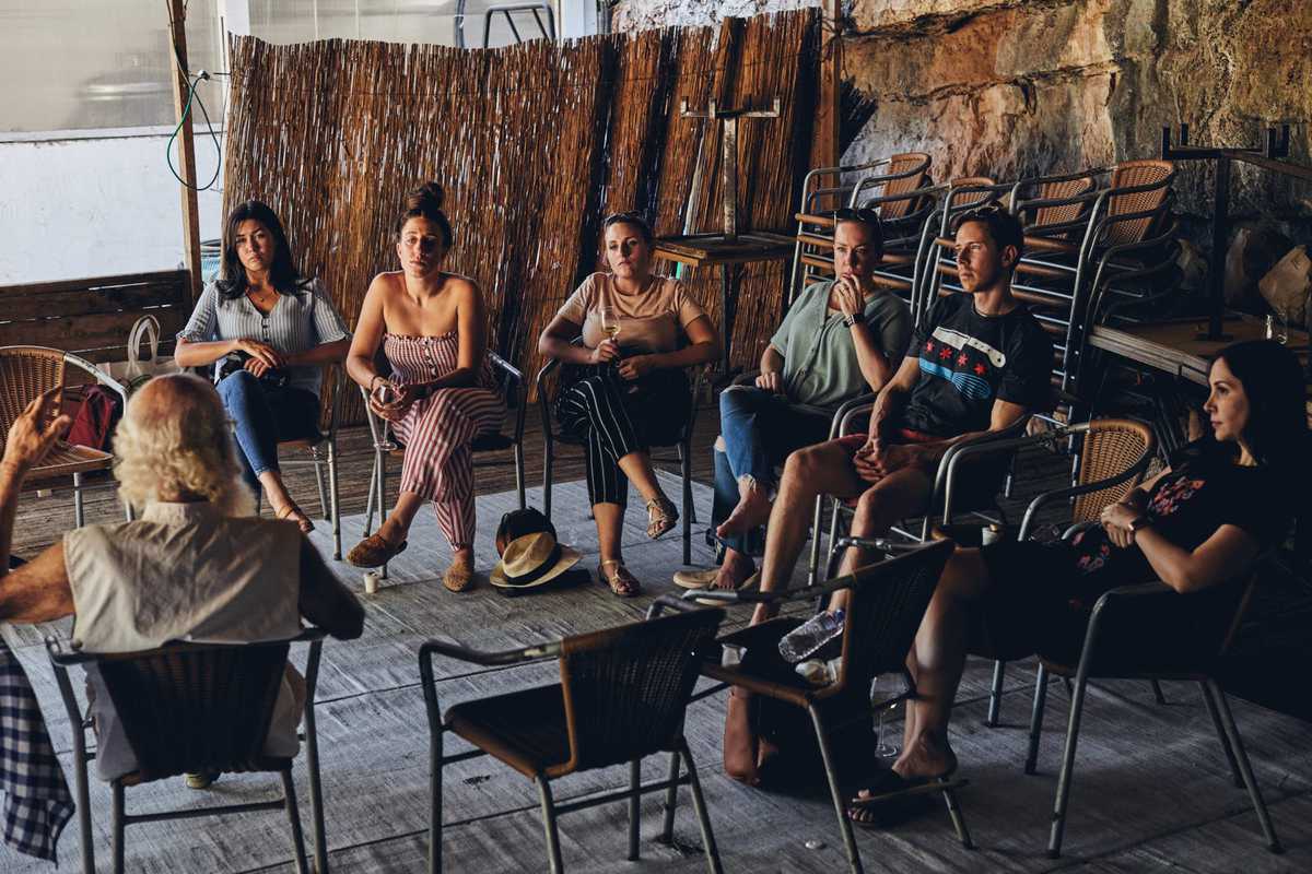 bloggers visiting goat farm in Israel