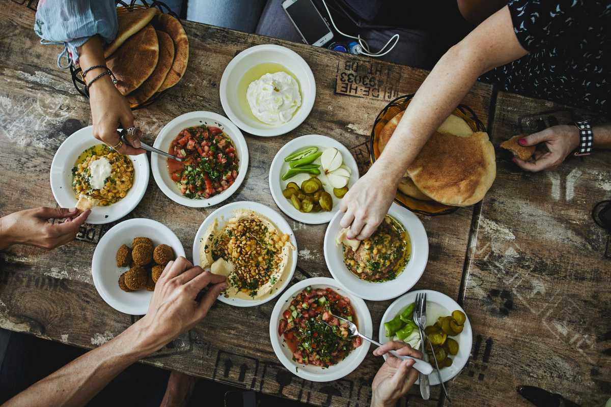 table of hummus and dips in Israel