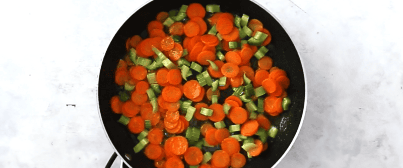 carrots and celery in a pan