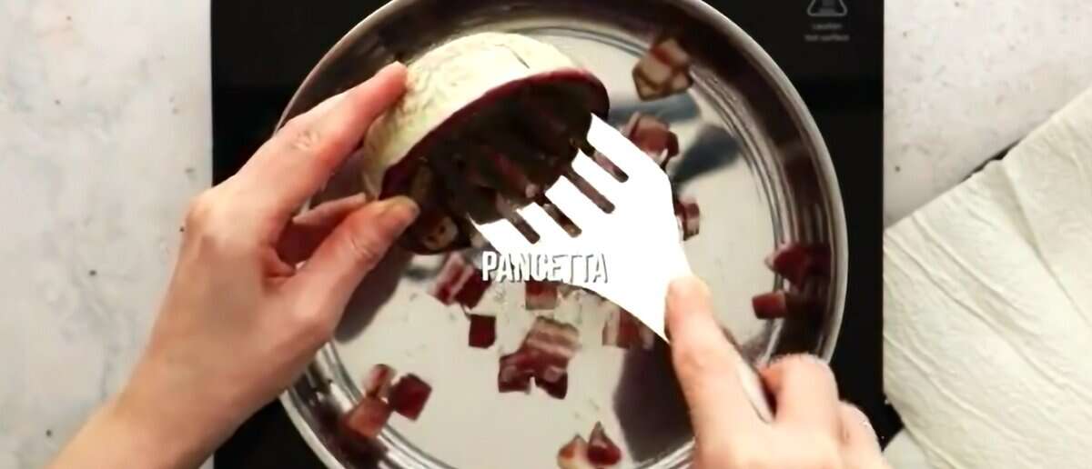 Cooking pancetta in a skillet.
