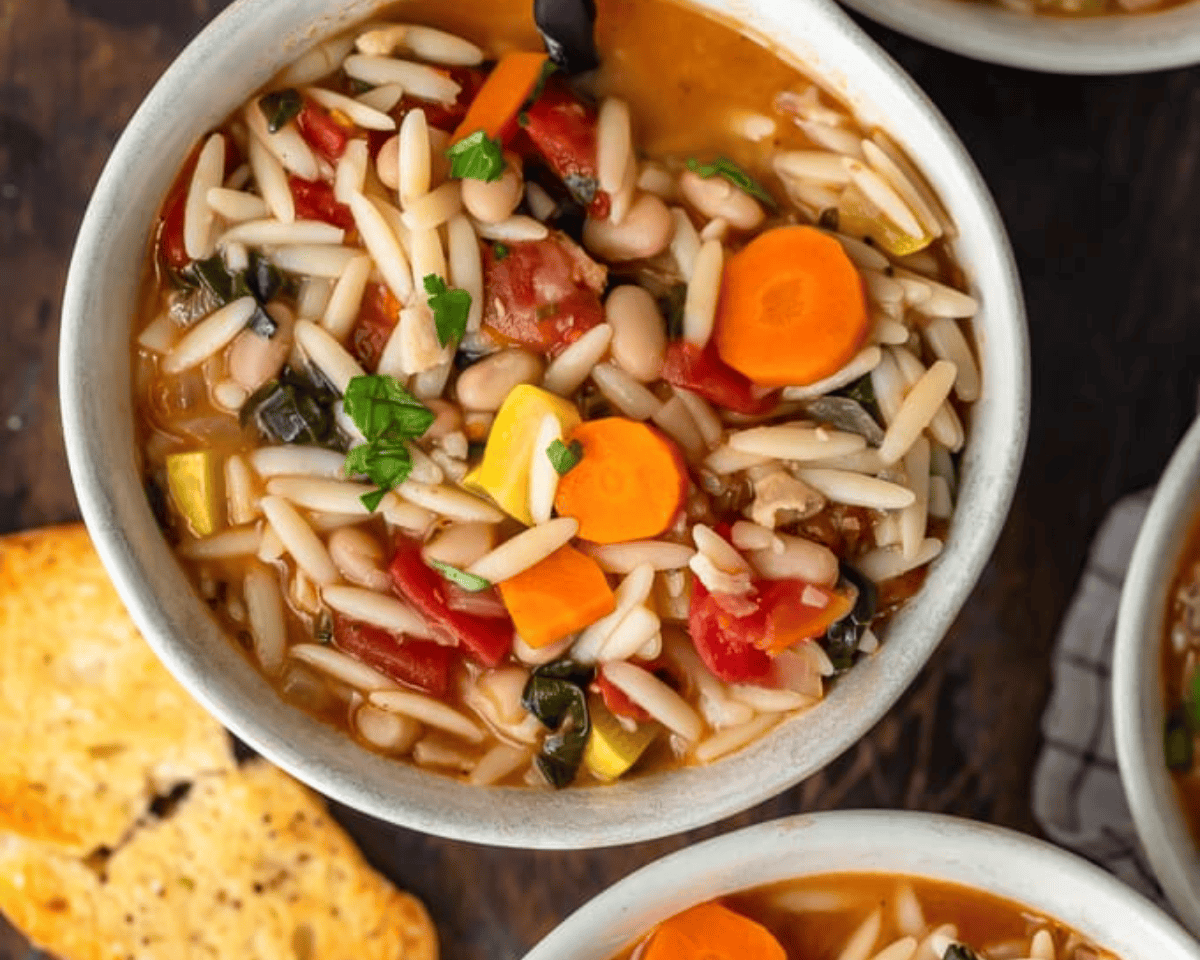 Overhead view of a bowl of minestrone.