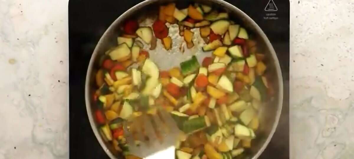Add squash and zucchini to the skillet with the other vegetables. 