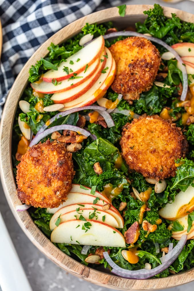 Overhead view of a kale apple salad with maple pumpkin dressing