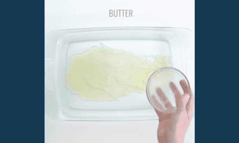 butter poured into a baking dish.