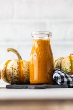 Maple Pumpkin Salad Dressing is the best autumn salad dressing recipe! Nothing says fall like pumpkin, and a bit of maple adds a rich flavor to it. This homemade salad dressing goes with all of your fall salad ideas, and it's the perfect kale salad dressing!