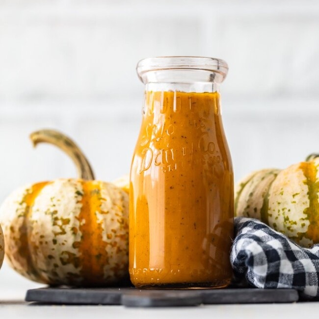 Maple Pumpkin Salad Dressing is the best autumn salad dressing recipe! Nothing says fall like pumpkin, and a bit of maple adds a rich flavor to it. This homemade salad dressing goes with all of your fall salad ideas, and it's the perfect kale salad dressing!