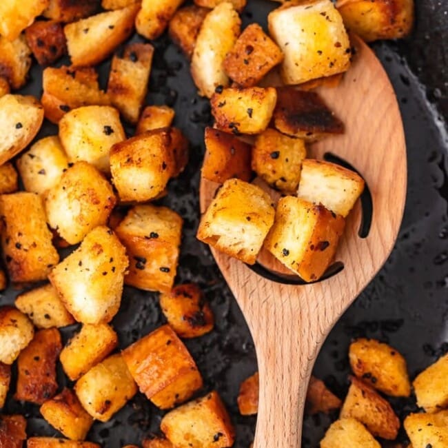 Garlic croutons are so easy to make, and they add the perfect flavor and crunch to your salads. Making croutons on the stove is quick and simple! Just follow this homemade crouton recipe and skip the pre-made ones!