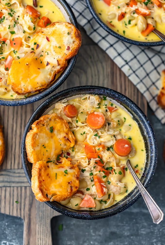Cheesy soup recipe with pasta, carrots, chicken, and more