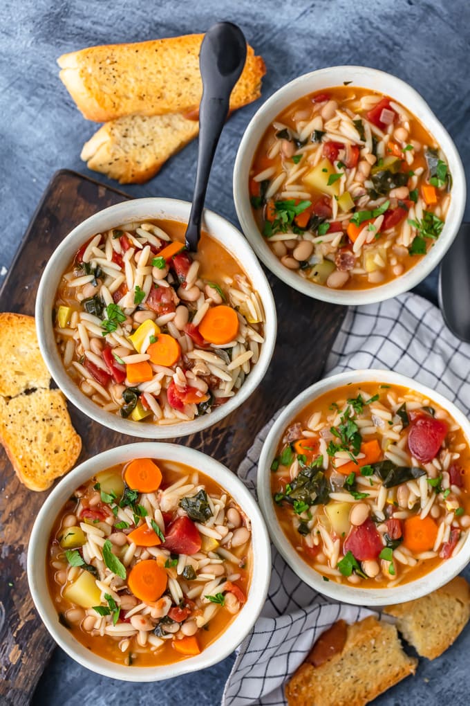 Four bowls of the best minestrone soup recipe viewed from above