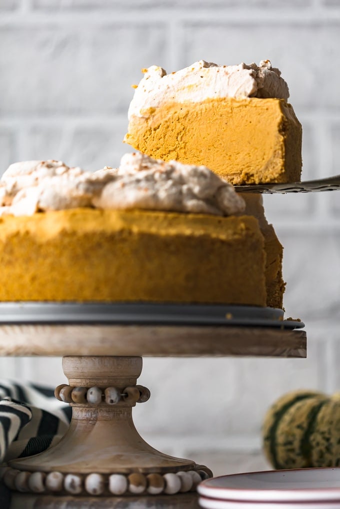 Pumpkin pie cheesecake on a cake stand